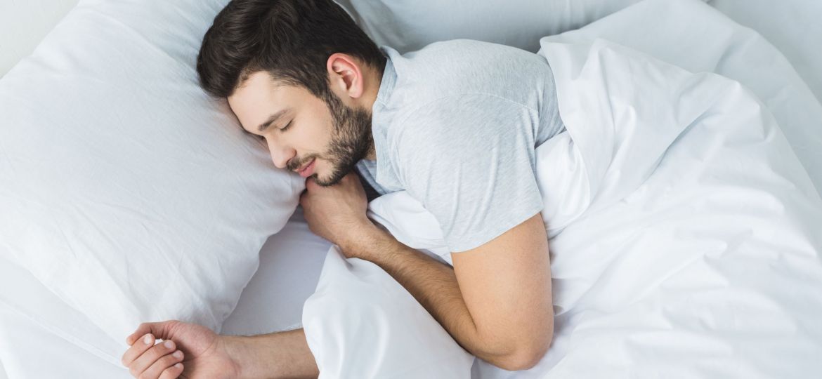 sleeping man with periodic limb movement disorder